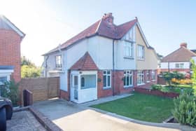 This property comes with three bedrooms, two bathrooms and a reception room as well as a garden and parking.
