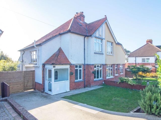 This property comes with three bedrooms, two bathrooms and a reception room as well as a garden and parking.