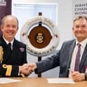 Naval Base Commander, Commodore John Voyce, left, signing the covenant with Professor Graham Galbraith, Vice-Chancellor of the University of Portsmouth