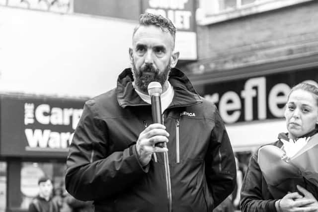 Eugene speaking at an event in London called Your City Says No in 2019.