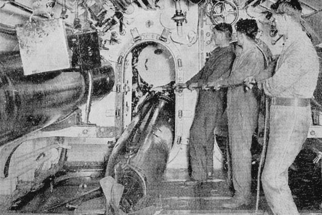 Submariners loading a torpedo. Picture: Rod Davis collection