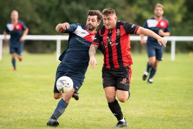 Paulsgrove's Ben Vassallo, left, and Perry Easton of Fleetlands in Hampshire Trophy action in October 2019.
Picture: Keith Woodland