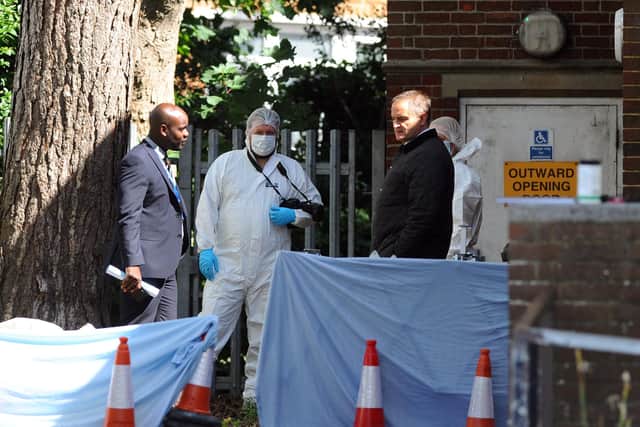 Pictured is: Forensic officers and detectives inspecting the scene.

Picture: Sarah Standing (030720-5352)