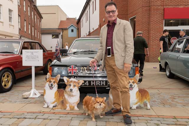 Pictured is: Lola with his owner and their Ford Granda Estate that was used by the Queen on the Balmoral estate.Picture: Keith Woodland (110921-8)