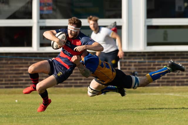 USP's Sam Masters scores a try against Romsey. Picture: Keith Woodland