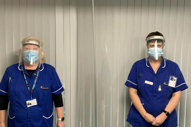 Carers Claire Wright and Sue Carstairs from Crescent Community Care in Southsea received their vaccines this week. Picture: Crescent Community Care