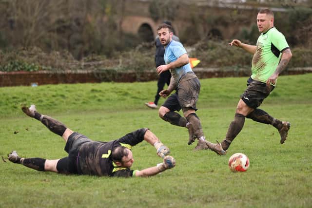 The Bedhampton keeper saves during his side's 8-1 Challenge Cup loss to Wicor Mill. Picture by Kevin Shipp