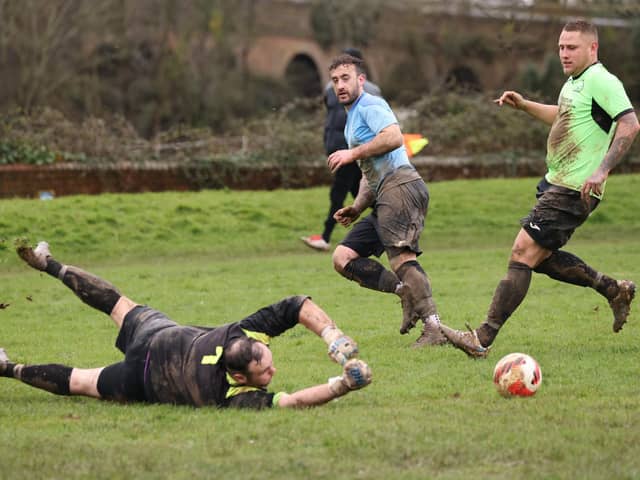 The Bedhampton keeper saves during his side's 8-1 Challenge Cup loss to Wicor Mill. Picture by Kevin Shipp