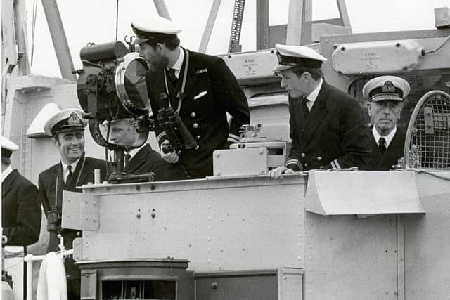 Lord Mountbatten watches as Prince Charles brings his minehunter HMS Bronington alongside at HMS Vernon, Portsmouth.