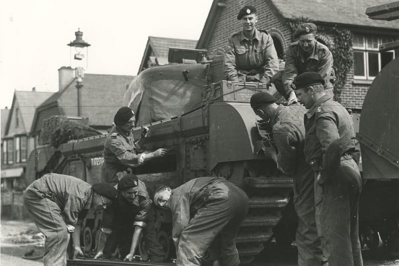 Churchill tank crews prepare to embark(c) The News, War Series 2873