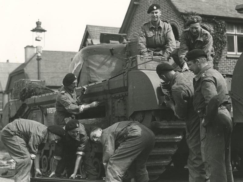 Churchill tank crews prepare to embark(c) The News, War Series 2873