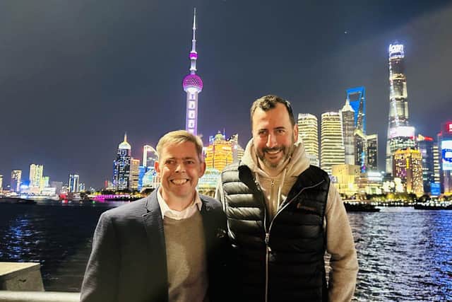 UNITED: Barnbrook Systems managing director Andrew Barnett, left, and Flair director Richard Dunn, right, in Shanghai on a joint business trip