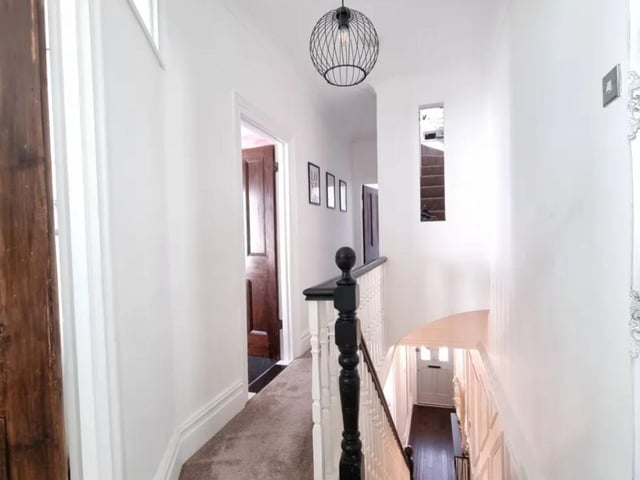 The listing says: "The accommodation is arranged over three floors and comprises; hallway, living room, dining room, kitchen/ breakfast room, cloakroom, utility room and family room on the ground floor with three bedrooms and family bathroom on the first floor with a loft room on the top floor."