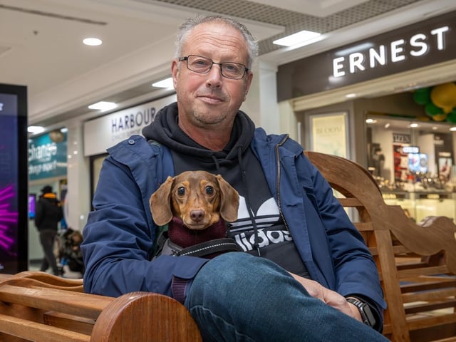 The crowds braved the wind and rain to watch the Christmas lights being switched on in Fareham highstreet on Saturday evening, while some of the entertainment was moved into the shopping centre.Pictured - Otto the Sausage with owner AndyPhotos by Alex Shute