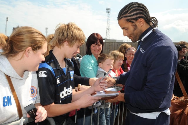 David James signs autographs as Pompey prepare to board the coach for Wembley at Fratton Park in 2010