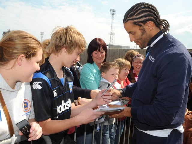 David James signs autographs as Pompey prepare to board the coach for Wembley at Fratton Park in 2010
