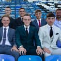 Eight new Pompey scholars pen two-year deals at Fratton Park. 
Back row: Academy chief Mark Kelly, Haji Mnoga, Alfie Stanley, Harry Kavanagh, Stan Bridgman and coach Liam Daish.
Front row: Tom Bruce, Ethan Robb, Liam Kelly and Leon Pitman
Picture: Portsmouth FC
