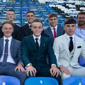 Eight new Pompey scholars pen two-year deals at Fratton Park. 
Back row: Academy chief Mark Kelly, Haji Mnoga, Alfie Stanley, Harry Kavanagh, Stan Bridgman and coach Liam Daish.
Front row: Tom Bruce, Ethan Robb, Liam Kelly and Leon Pitman
Picture: Portsmouth FC