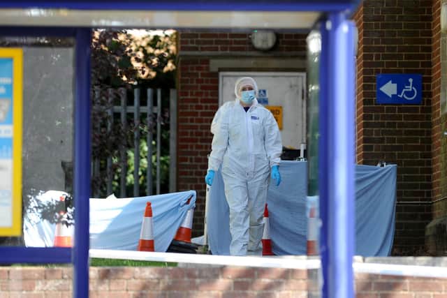 Forensic officers investigating the scene.
Picture: Sarah Standing (030720-5328)