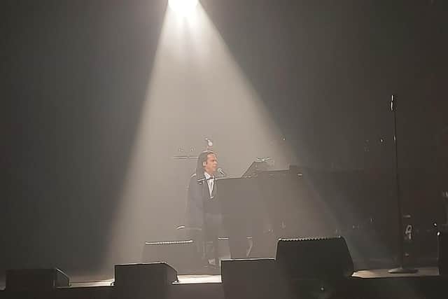 Nick Cave alone at the piano at The Kings Theatre