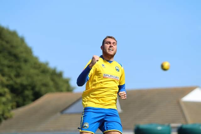 Harvey Bradbury celebrates his debut penalty against Merthyr. Picture by Tom Phillips