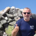 67-year-old Robin Moriarty at the summit of Carn an Righ.