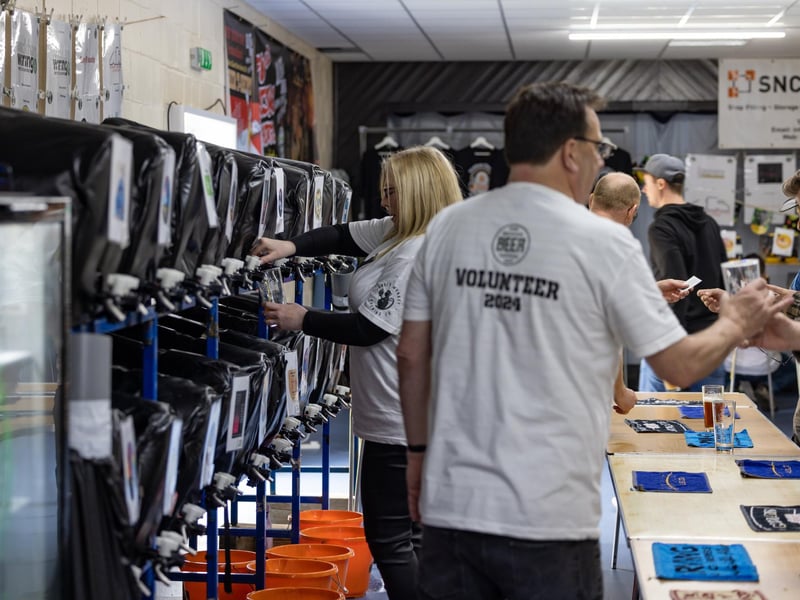 The busy serving area at the Wickham Beer Festival. Picture: Mike Cooter (060424)
