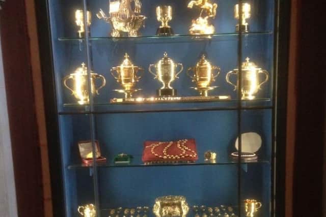 Display cabinet along the public route in the castle from which a set of gold rosary beads carried by Mary Queen of Scots to her execution in 1587 were taken, among other historic treasures worth more than £1 million stolen in a raid at Arundel Castle.Arundel Castle/PA Wire
