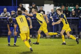 Jack Lee (middle) wheels away after scoring a stunning goal for Moneyfields in last night's Wessex League victory at Baffins. Picture by Dave Bodymore.