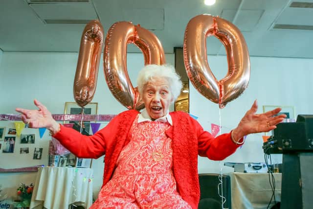 100-year-old Marge Dunaway celebrates her birthday at the Royal Beach Hotel surrounded by family and friends