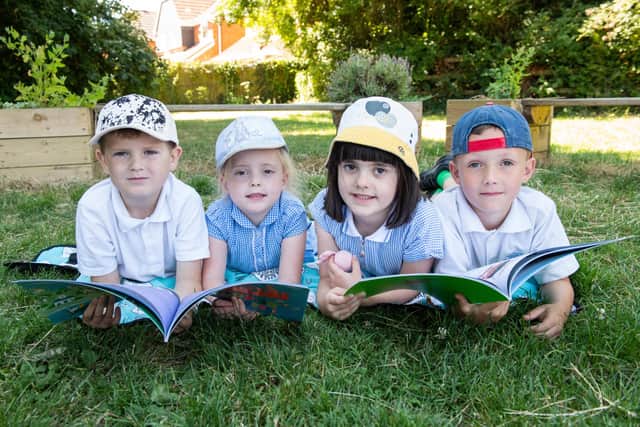 Children from Bedenham Primary School with their new books. Picture: Tony Kershaw