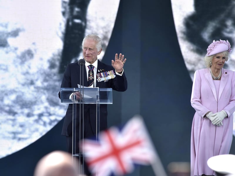 HRH King Charles and Queen Camilla on stage during the D-Day 80 commemorations on Southsea Common on June 5. Picture: Sarah Standing (050624-3671)