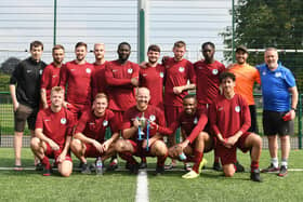 Burrfields with the Oscar Owers Cup. Back (from left): Jordan Shuttleworth, Max Bleach, Tom Duff, Charles Flatman, Jesse Parkis, Joe Western, Josh Currie, Kevin Parry, Duane Gray, Brian Kirby (manager). Front: Sam Lucas, Jack Palmer, Richie Leader (captain), Clinton Uzochukwu and Ali Shioui. Picture: Neil Marshall