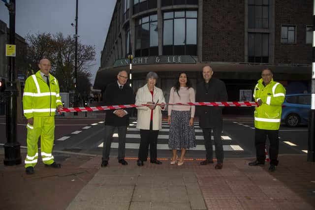 From left, Steve Hill from Colas, Portsmouth City Council highways PFI commercial manager Michael McLaughlin, council cabinet member for traffic and transportation Cllr Lynne Stagg, Colas lead asset manager Shine Salur, the council's assistant director for infrastructure Martin Lavers, and Ray Muscat from Colas