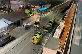 Ambulances attend Portsmouth International Port after Saga's Spirit of Discovery docks on November 6.