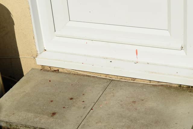 A handyman was called to board-up the broken window. 
Picture: Sarah Standing (060320-6558)