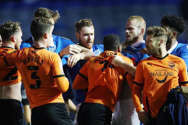 Pompey and Oxford players clashed after last week's 1-1 draw. Picture: Joe Pepler