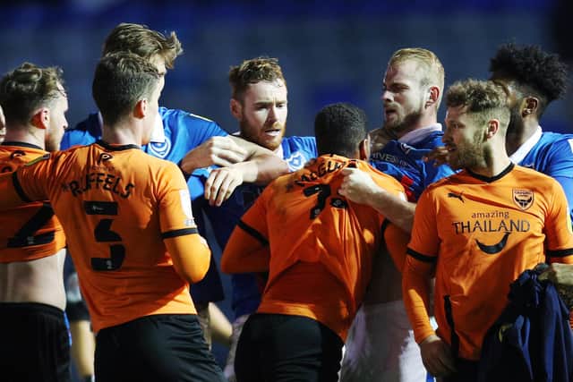 Pompey and Oxford players clashed after last week's 1-1 draw. Picture: Joe Pepler