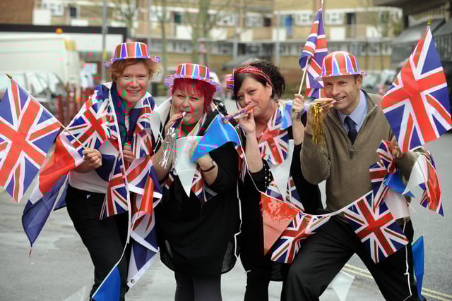 U-Need-Us staff (l-r) Allison Brookes (correct), Karen Knipe, Tracey Knipe and Steve Searle get the street party started outside the store in February 2011. Picture: Allan Hutchings (110573-278)