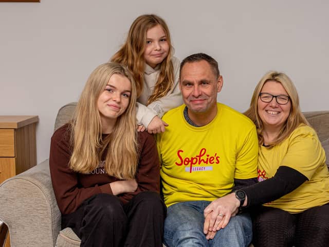 Sophie's legacy a year on. Story on Sophie Fairall's legacy and how far they have come since her funeral last year.

Pictured: Sophie's family, Lucy 16, Amelia 10, Gareth and Charlotte Fairall at their home in Stubbington on Monday 12th December 2022

Picture: Habibur Rahman