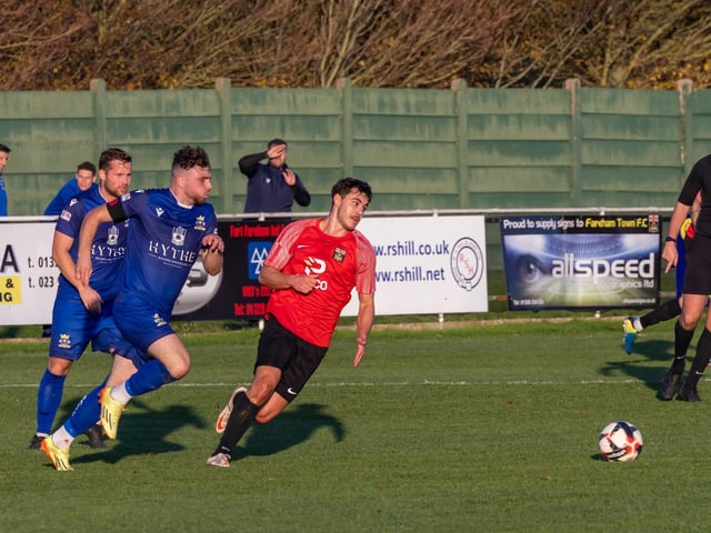 Fareham (red) v Baffins Milton Rovers. Picture: Mike Cooter