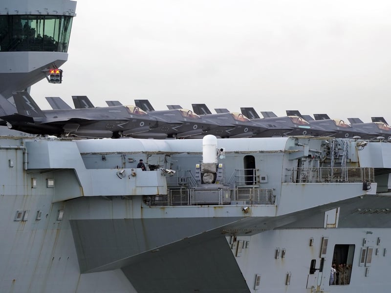 F35b jets line the deck of HMS Queen Elizabeth, as the Royal Navy aircraft carrier leaves Portsmouth Harbour. Picture date: Friday November 3, 2023. PA Photo. Photo credit should read: Andrew Matthews/PA Wire
