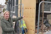 Lawrence Arms landlady Alison Wearn standing outside her pub hours after a car ploughed through one of its walls.
