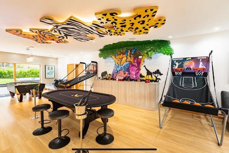 The kids definitely won't get bored with this crazy games room equip with a pool table, poker and air hockey as well as a PS4 and Xbox. Not forgetting snacks and sweet dispensers on hand to keep you going!