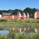 Taylor Wimpey is inviting homebuyers to Woodlands Chase to take a look at its unfinished homes.