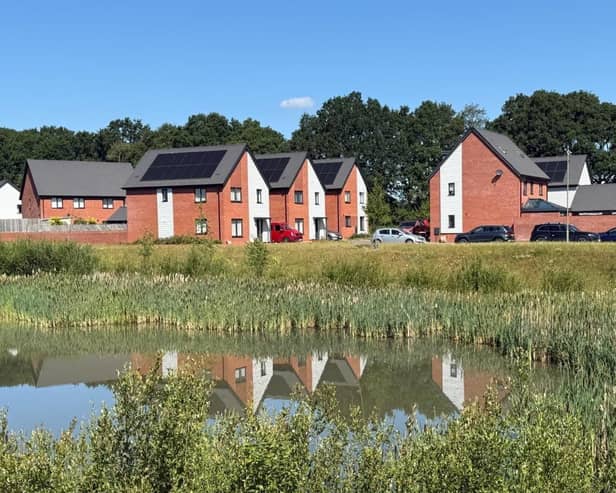 Taylor Wimpey is inviting homebuyers to Woodlands Chase to take a look at its unfinished homes.