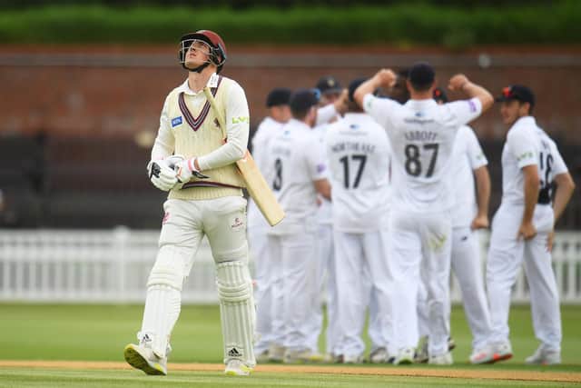 Tom Banton looks skywards after being dismissed by Keith Barker. Photo by Harry Trump/Getty Images.
