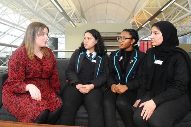 From left, Charlotte Seddon-Ellis from Lockheed Martin talking to Camila Almeida, 15, Wendy Ehigie, 15, and Atiya Ahmed, 16, from The Portsmouth Academy.
Picture: Sarah Standing (100320-7073)