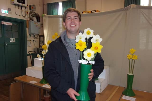 Peter Rogers with his award winning vase of Daffodils