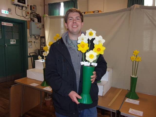 Peter Rogers with his award winning vase of Daffodils